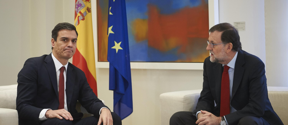 El presidente del Gobierno, Pedro Sánchez junto al expresidente, Mariano Rajoy
Madrid