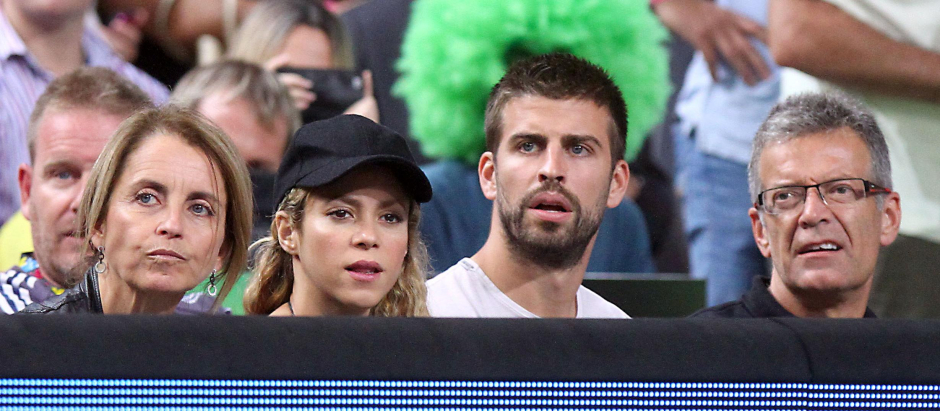 Gerard Pique and singer Shakira with Joan Pique and Montserrat Bernabeu attend a Basketball World Cup at the Palau Sant Jordi in Barcelona, Spain, Tuesday, Sept. 9, 2014
