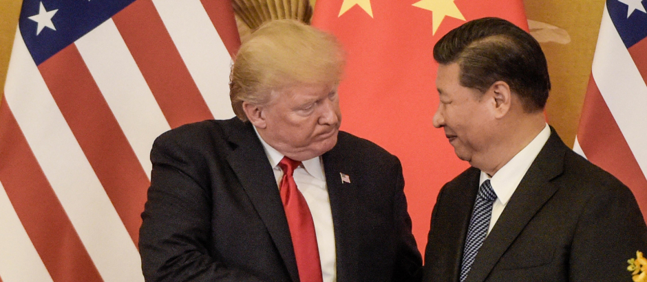El expresidente de los EE.UU., Donald Trump (Iz), con el presidente de China, Xi Jinping en 2017