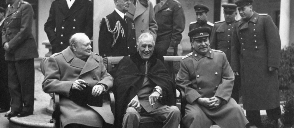 Conference of the Big Three at Yalta makes final plans for the defeat of Germany.  Here the "Big Three" sit on the patio together, Prime Minister Winston S. Churchill, President Franklin D. Roosevelt, and Premier Josef Stalin.  February 1945. (Army)
Exact Date Shot Unknown
NARA FILE #:  111-SC-260486
WAR & CONFLICT BOOK #:  750