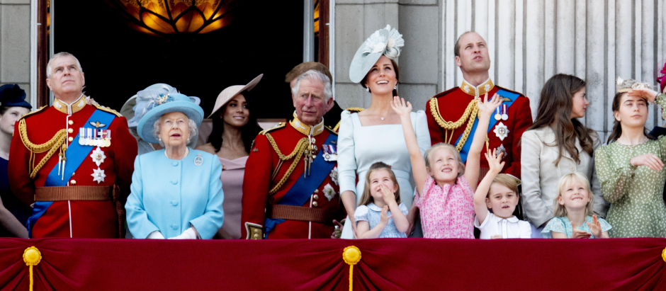 Queen Elizabeth , Prince Charles of Wales , Prince William , Kate Middleton , Princess Charlotte , prince George , Prince Harry , Meghan Markle , Princess Anne , princess Eugenie , princess Beatrice , princess Andrew and other royal members attending Trooping The Colour, London.  *** Local Caption *** .