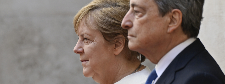 Mario Draghi y Angela Merkel