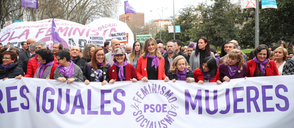 Politician Carmen Calvo, Nadia Calviño  and Begoña Gomez a rallyto mark the International Women's Day in Madrid, Spain, Sunday, March 8, 2020.
en la foto: pancarta leyenada " feminismo. socialismo psoe "