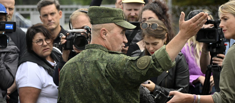Leonid Kasinsky, an adviser to the Belarus Defence Minister, speaks to the media near a tent camp site that, according to Belarusian Defence Ministry officials, could be offered as one of the spots to house Wagner fighters, in the military settlement of Tsel in the Asipovichy District of the Mogilev Region in Belarus on July 7, 2023. (Photo by Alexander NEMENOV / AFP)