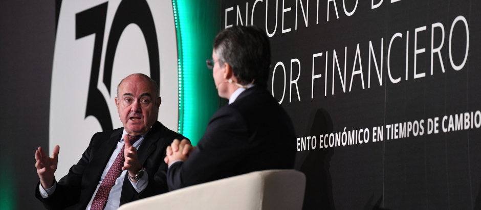 El vicepresidente del BCE, Luis de Guindos, y presidente de Deloitte, Héctor Flórez