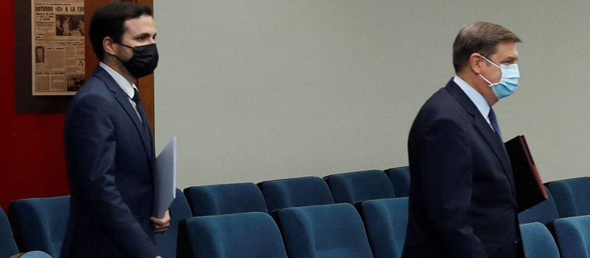 Planas y Garzón entrando juntos a una rueda de prensa pasada