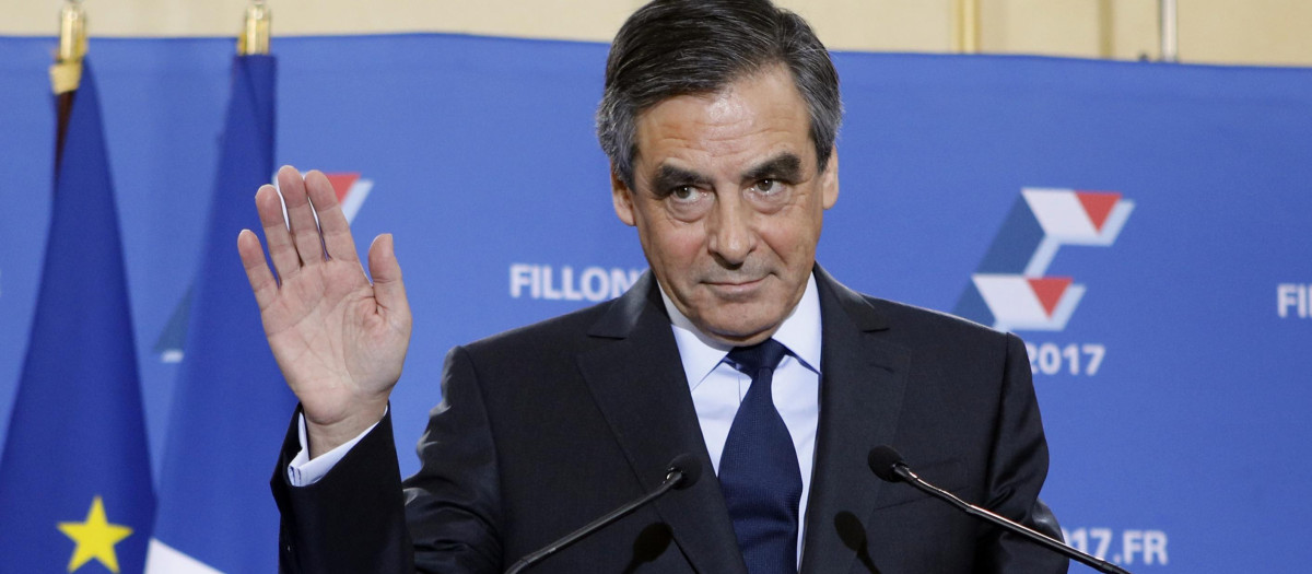 Francois Fillon acknowledges after the official announcement of results in the conservative party's national primary election in Paris, France, Sunday, Nov. 27, 2016 in Paris.