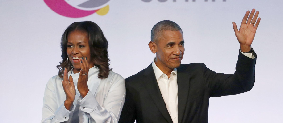 FILE - In this Oct. 31, 2017, file photo, former President Barack Obama, right, and former first lady Michelle Obama appear at the Obama Foundation Summit in Chicago.