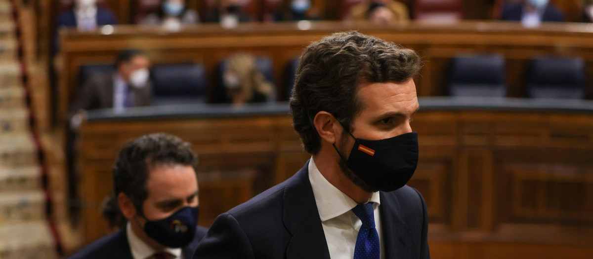 El líder del PP, Pablo Casado, durante el pleno del Congreso de los Diputados, que debate y vota la convalidación de la reforma laboral pactada por el Gobierno con los agentes sociales, este jueves en Madrid