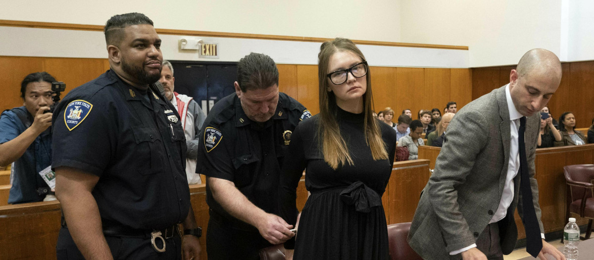 Anna Sorokin, center, and her lawyer Todd Spodek, right, arrive for her sentencing at New York State Supreme Court in New York, Thursday, May 9, 2019. Sorokin, who claimed to be a wealthy German heiress, was sentenced to four to 12 years behind bars for defrauding New York banks and hotels. (Steven Hirsch/New York Post via AP, Pool)
