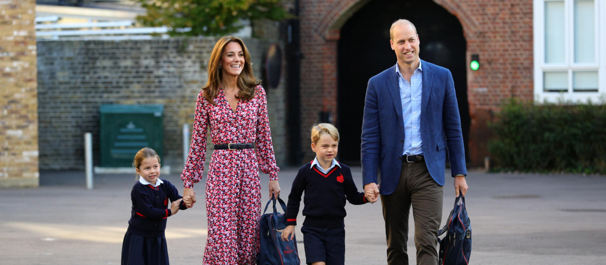 Princess Charlotte arrives for her first day at school at Thomas's Battersea in London, with her brother Prince George and her parents Prince William and Kate Middleton the Duke and Duchess of Cambridge. *** Local Caption *** .