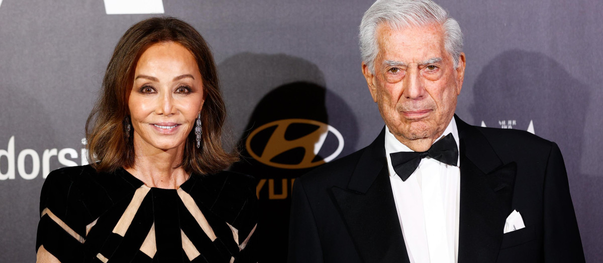 Writer Mario Vargas Llosa and Isabel Preysler at photocall for 12 edition of Mujer Hoy awards 2021 in Madrid on Tuesday, 30 November 2021.