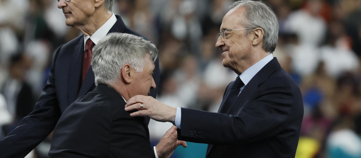 Florentino Pérez y Ancelottí tras conquistar la Champions en París