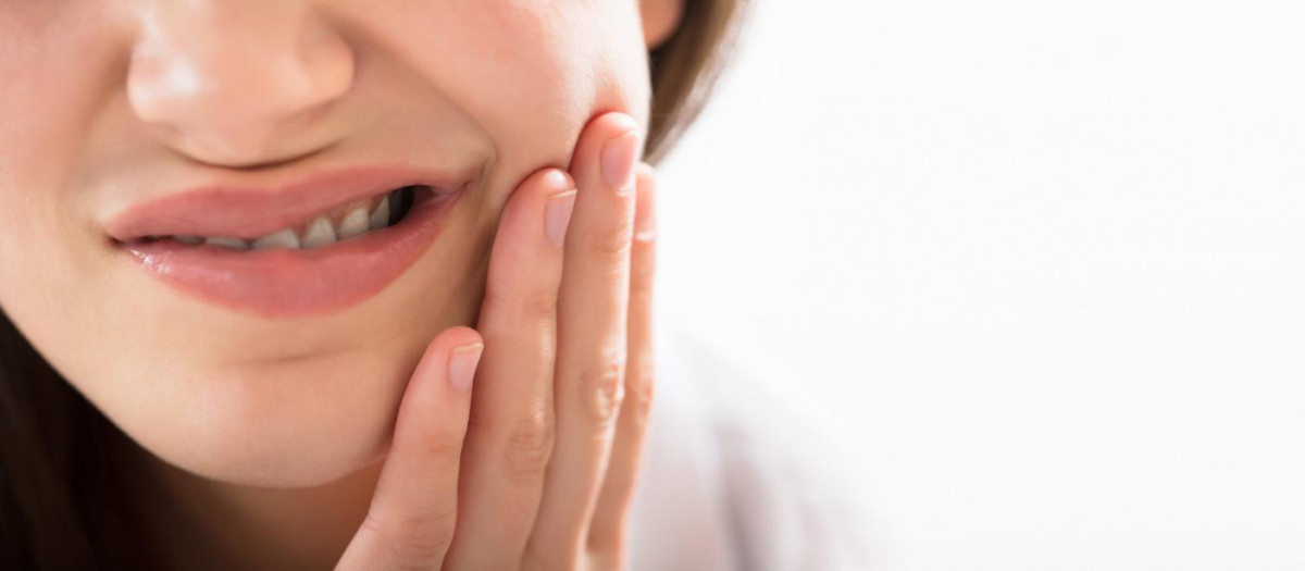 Close-up Of A Woman Having Tooth Problem.Woman,Having,tooth, decay, sore, dental, pain, ache, man, teeth,tooth, decay, sore, dental, pain, ache, man, teeth,tooth, decay, sore, dental, pain, ache, man, teeth, mouth, toothache, dermatology, home, medical, sick, patient, panoramic, unhappy, banner, background, health, problem, men, healthcare, oral, uncomfortable, hurt, worried, young, painful, male, touching, aching, lifestyle, adult, grief, closeup, illness, one, copy, space, indoors, caucasian, sensitivity