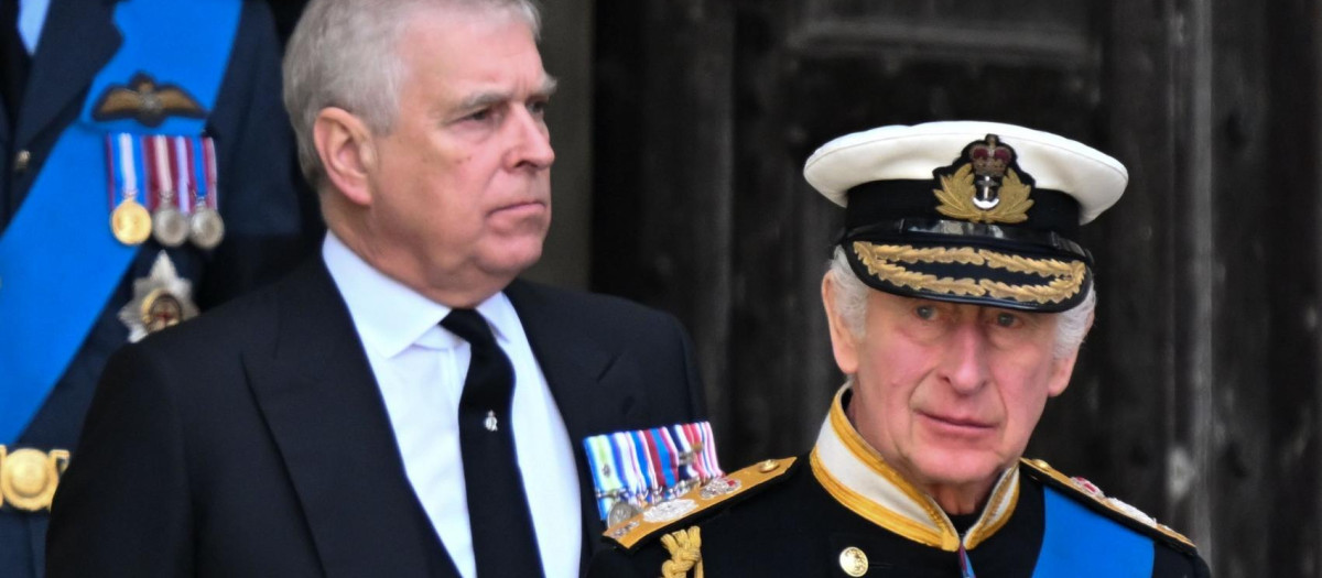 Britain's King Charles III and Prince Edward during the carriage procession for Queen Elizabeth II's state funeral from London to Windsor on 19 September 2022