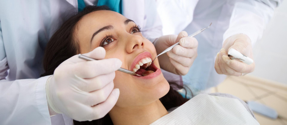 .doctor,physician,medic,medical practicioner,woman,humans,human beings,people,folk,persons,human,human being,laugh,laughs,laughing,twit,giggle,smile,smiling,laughter,laughingly,smilingly,smiles,job,inside,medicinally,medical,lifestyle,lady,female,teeth,dentist,person,blank,european,caucasian,look,glancing,see,view,looking,peeking,looking at,hospital,clinic,open,visit,dapper,accosting,pretty,prettily,prettier,ravishing,attractive,means,agent,medicine,drug,remedy,substance,medicin,patient,caries,toothache,uncap,assistant,delighted,unambitious,enthusiastic,merry,radiant with joy,joyful,glad,carefree,happy,cheerfully,cheerful,gladder,surgery,filling,dentistry,nurse,examination,specialist,practitioner,procedure,working,young,younger,work,labor,odontology,girl,girls,man,healthy,mouth,team,oral,orthodontist,indoors,stomatology,checkup,whitening