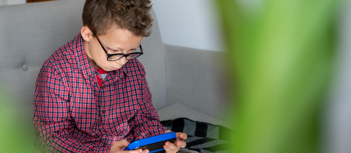 child boy playing with video game.child,boy,playing,video,game,child, boy, game, playing, video, caucasian, video game, electronic, person, technology, cute, young boy, console, fun, young, concentration, entertainment, gaming, play, digital, kid, male, one, childhood, concentrating, youth, screen, addiction, gadget, handheld video game, at home, addictive, gamer