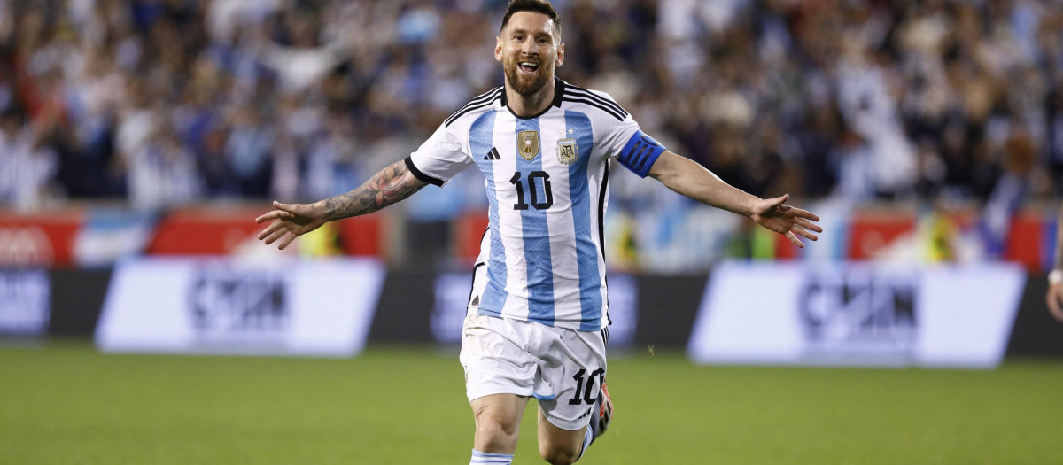 (FILES) In this file photo taken on September 28, 2022 Argentina's Lionel Messi celebrates his goal during the international friendly football match between Argentina and Jamaica at Red Bull Arena in Harrison, New Jersey. - Argentina captain Lionel Messi leads the 26-man squad for the Qatar 2022 World Cup, which esi:includes Angel Di Maria and Paulo Dybala, both recovered from injuries. (Photo by Andres Kudacki / AFP)