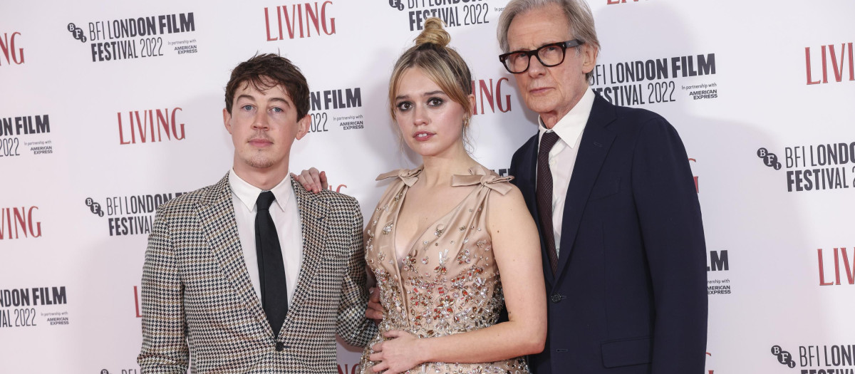 Alex Sharp, from left, Aimee Lou Wood and Bill Nighy pose for photographers upon arrival for the premiere of the film 'Living' during the 2022 London Film Festival in London, Sunday, Oct. 9, 2022.  *** Local Caption *** .