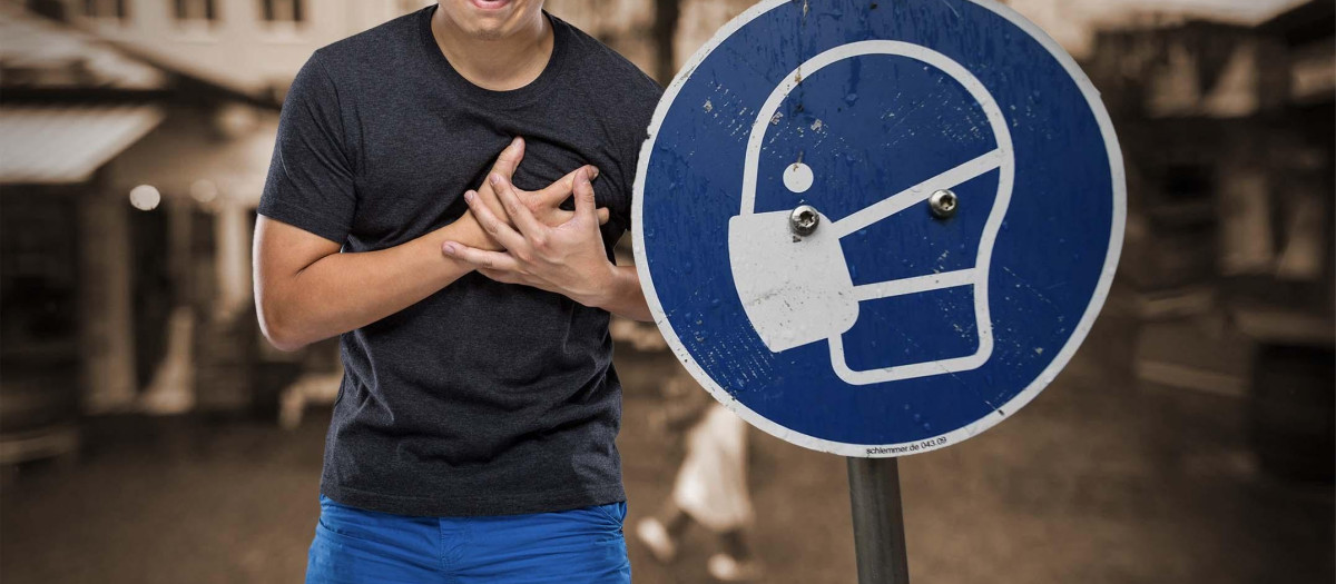 Una señal indica la obligatoriedad de portar la mascarilla en Alemania