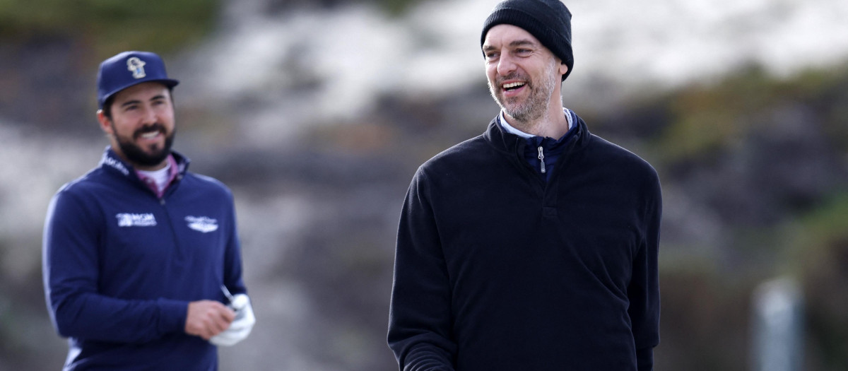 Mark Hubbard and Pau Gasol walk up the third hole during the first round of the AT&T Pebble Beach Pro-Am at