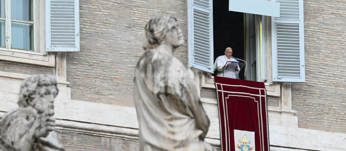 Pope Francis speaks from the window of the apostolic palace during the weekly Angelus prayer on February 26, 2023 in The Vatican. (Photo by Vincenzo PINTO / AFP)