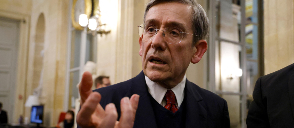 (FILES) In this file photo taken on March 15, 2023, member of the center-right "Libertes, Independants, Outre-mer et Territoires" parliamentary group Charles de Courson answers to journalists after a group meeting following the outcome of the joint committee (Commission mixte paritaire) on pension reform at the National Assembly, in Paris. - The centrist Charles de Courson, has become at age 70 a fierce opponent of the pensions reform, manoeuvring to attempt to censure the government. (Photo by Ludovic MARIN / AFP)