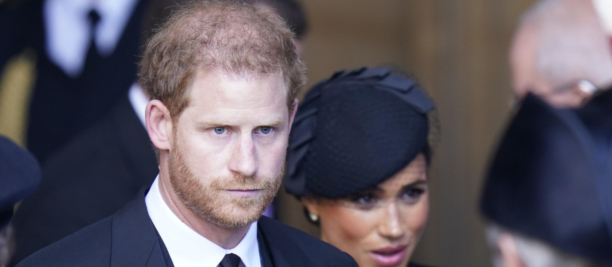 Britain's Prince Harry and Meghan Markle , Duchess of Sussex during transfer of Queen Elizabeth II's remains from BuckinghamPalace to WestminsterHall, London on September 14, 2022.