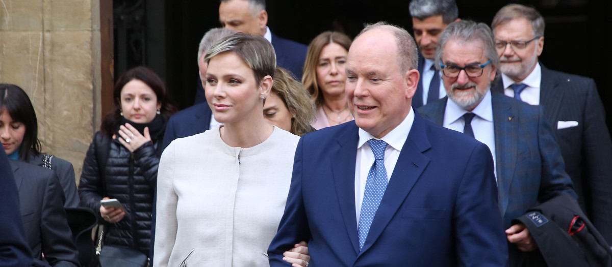 Prince Albert of Monaco with his wife Charlène Wittstock leave PalazzoGondiFoundation New