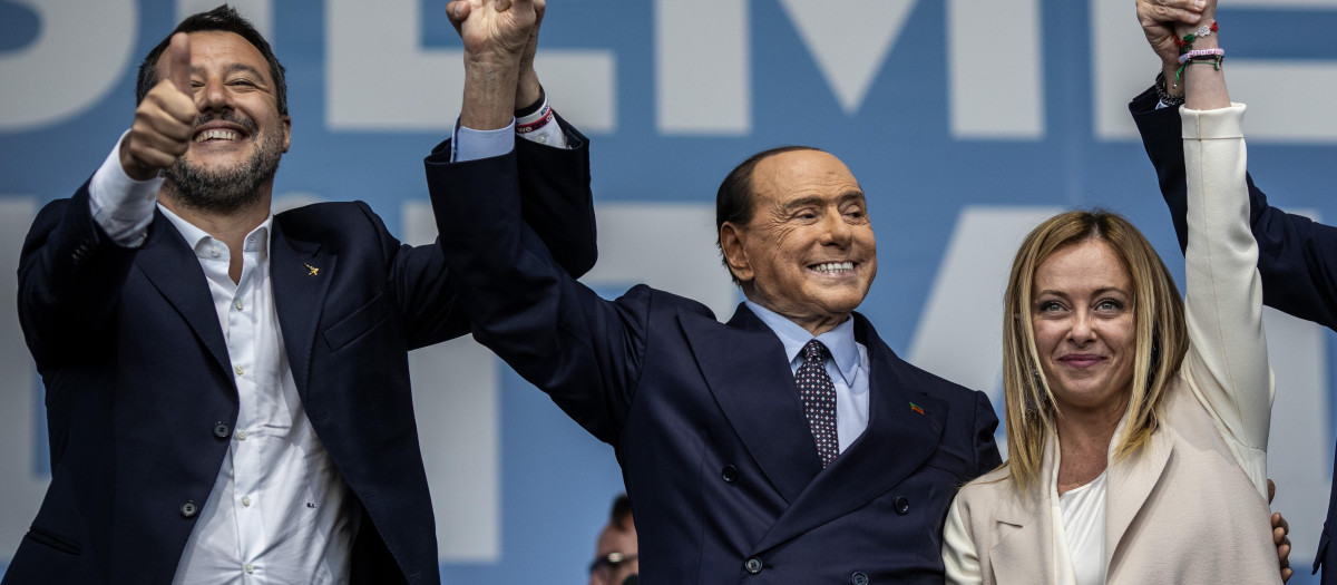 (L-R) Federal Secretary of Italy's Lega Nord party Matteo Salvini, Forza Italia leader Silvio Berlusconi, and leader of the far-right Fratelli d'Italia (Brothers of Italy) party Giorgia Meloni attend their coalition closing campaign rally in Rome. Italy will vote for a new parliament on 25 September 2022. 
elections parties politics