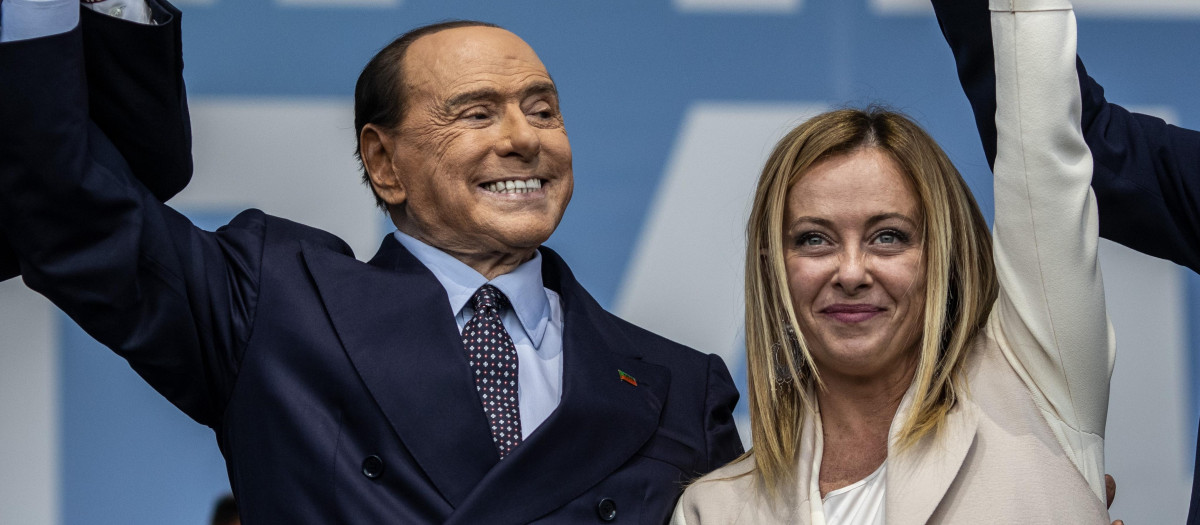 (L-R) Federal Secretary of Italy's Lega Nord party Matteo Salvini, Forza Italia leader Silvio Berlusconi, and leader of the far-right Fratelli d'Italia (Brothers of Italy) party Giorgia Meloni attend their coalition closing campaign rally in Rome. Italy will vote for a new parliament on 25 September 2022. 
elections parties politics