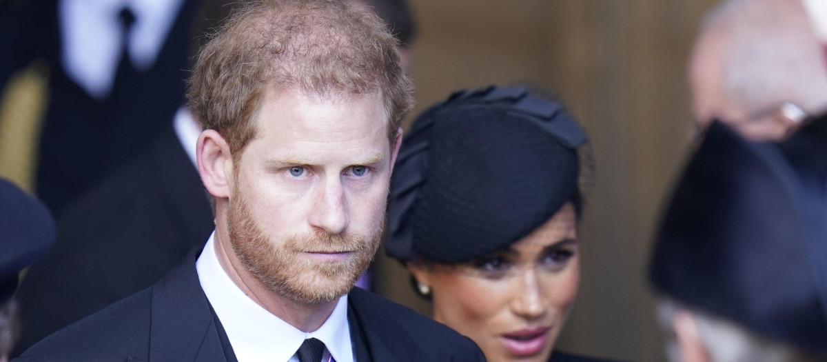 Britain's Prince Harry and Meghan Markle , Duchess of Sussex during transfer of Queen Elizabeth II's remains from BuckinghamPalace to WestminsterHall, London on September 14, 2022.