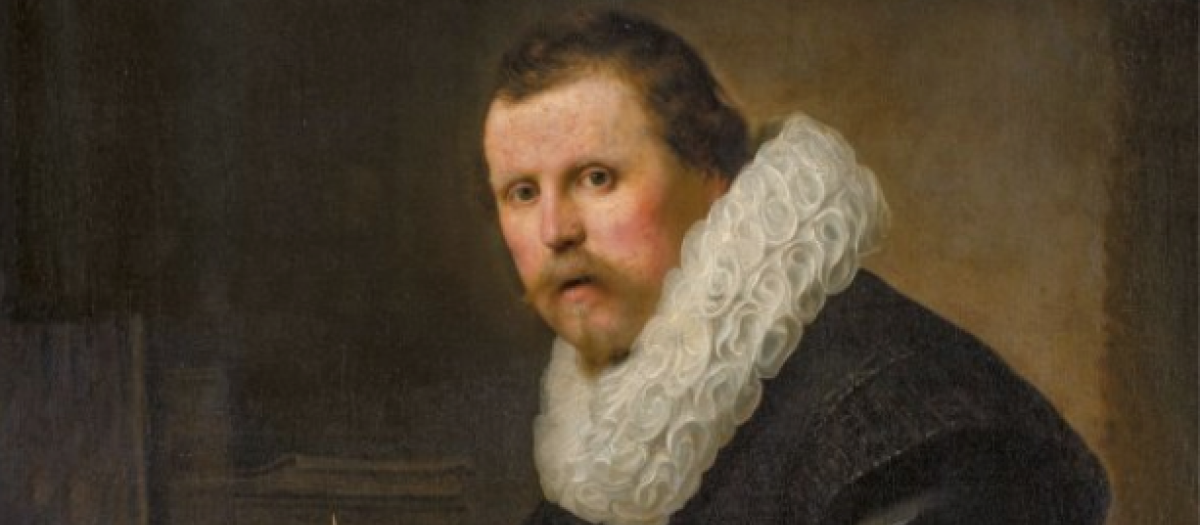 'Retrato de un hombre en un escritorio' de Rembrandt