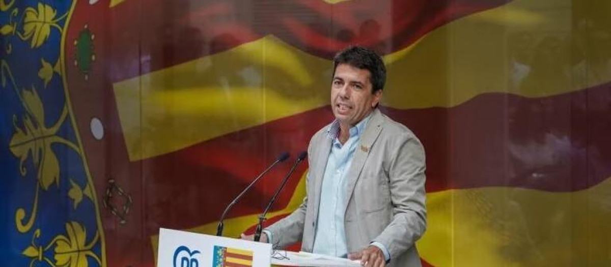 Carlos Mazón, en un acto del PP, con la Señera Valenciana de fondo.