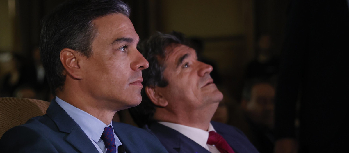 Pedro Sánchez y José Luis Escrivá