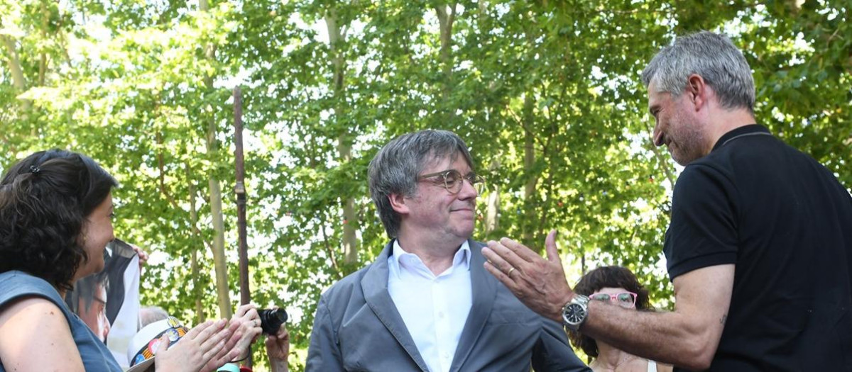 El expresidente de la Generalitat de Catalunya, Carles Puigdemont (c), durante el acto de celebración del cuarto aniversario de la fundación de Junts, en el Théâtre de Verdure, a 27 de julio de 2024, en Amélie-les-Bains-Palalda (Francia). Junts per Catalunya celebra su cuarto aniversario con este acto, en el que la formación arropa al expresidente catalán Carles Puigdemont, a quien no se le ha aplicado todavía la ley de amnistía. La celebración coincide con el tramo final de las negociaciones entre el PSC y ERC para facilitar la investidura de Salvador Illa como presidente de la Generalitat de Catalunya.
27 JULIO 2024;JUNTS;AMNISTÍA;INVESTIDURA;PRESIDENTE;GENERALITAT
Glòria Sánchez / Europa Press
27/7/2024