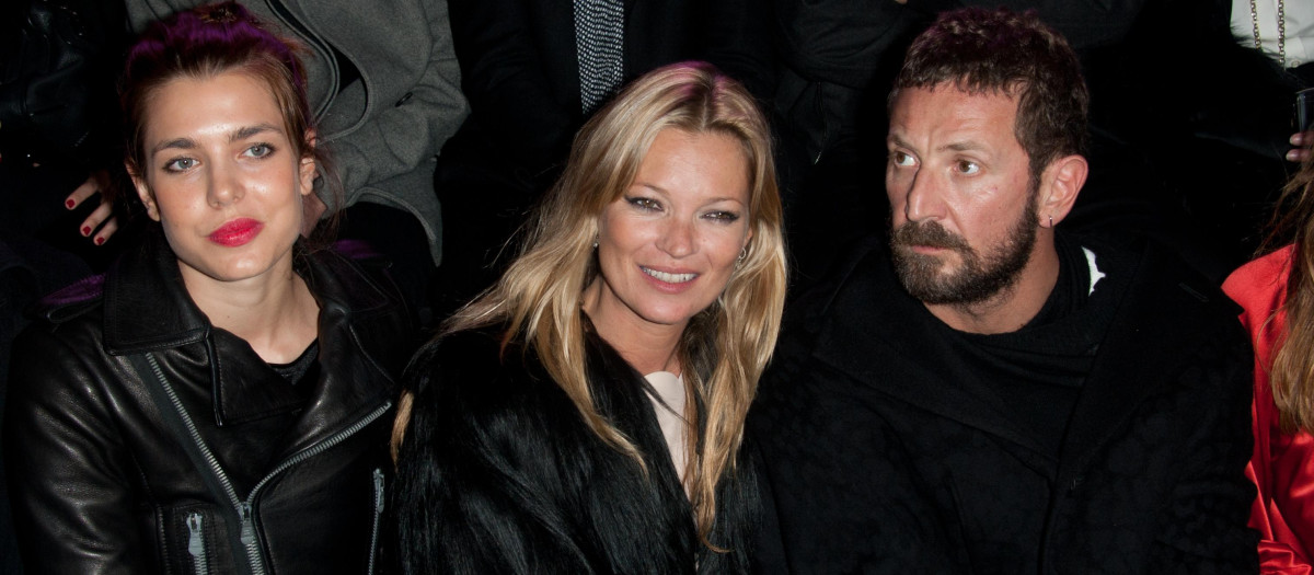 Charlotte Casiraghi , model Kate Moss and designer Stefano Pilati attend Etan show during Paris Fashion Week 2011