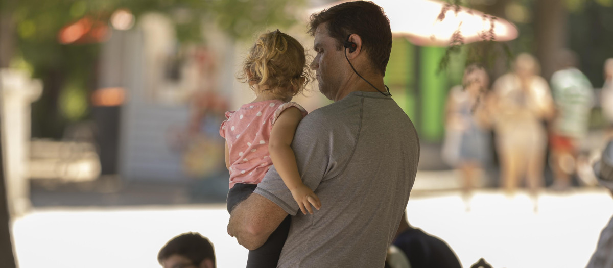 Una familia en el parque de El Retiro