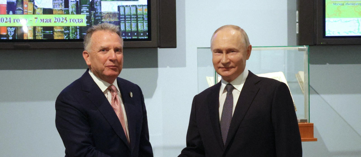 In this pool photograph distributed by the Russian state agency Sputnik, Russia's President Vladimir Putin shakes hands with US President Donald Trump's envoy Steve Witkoff during a meeting in Saint Petersburg on April 11, 2025. (Photo by Gavriil Grigorov / POOL / AFP)
