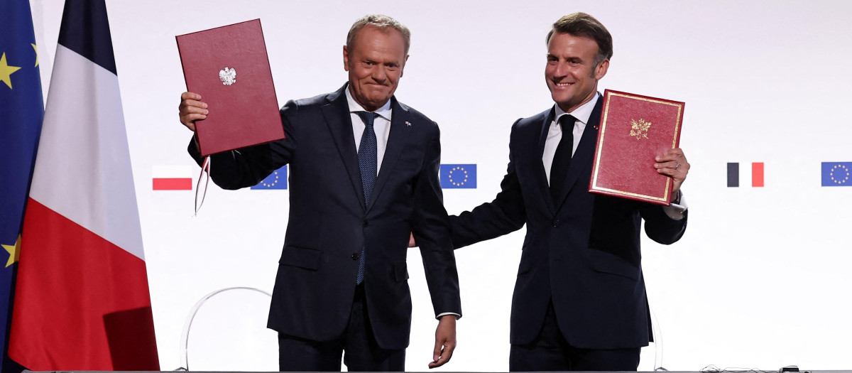 El presidente francés Emmanuel Macron junto al primer ministro Donald Tusk