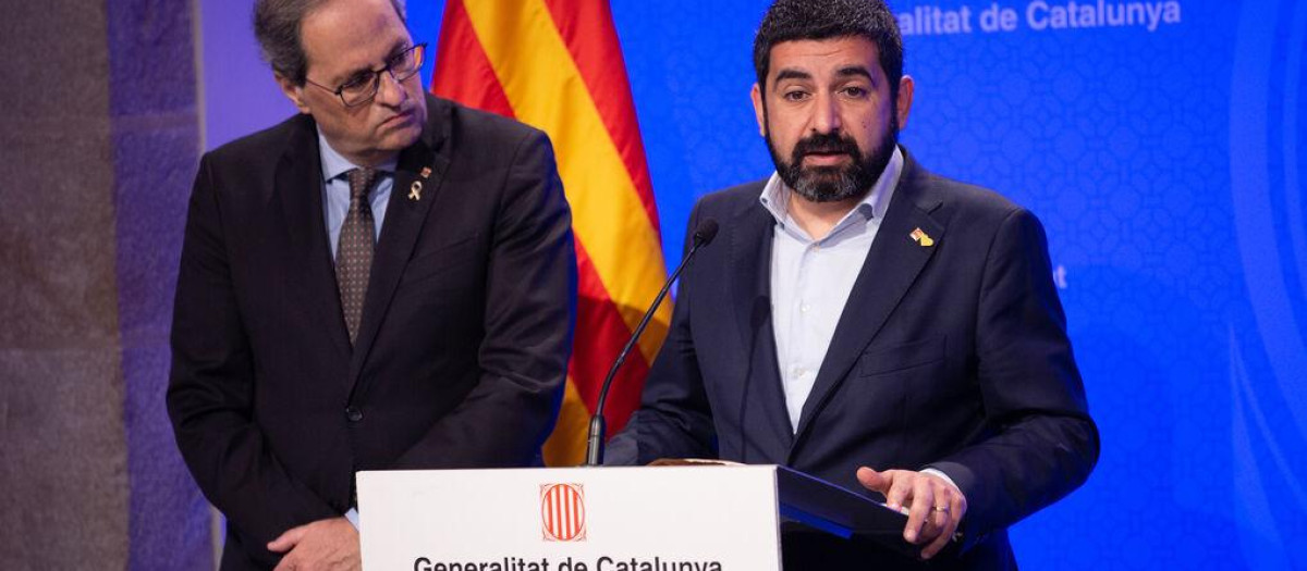 El que fuera consejero de Trabajo y Asuntos Sociales, Chakir el Homrani, de ERC, junto al expresidente de la Generalitat Quim Torra