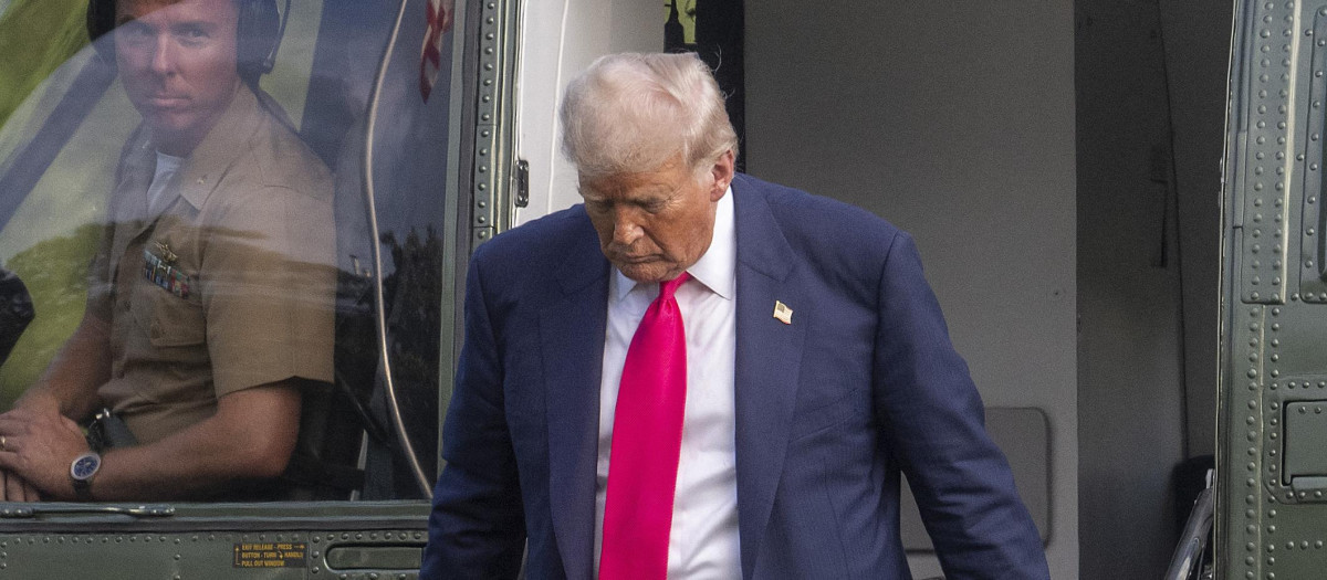 US President Donald Trump steps off Marine One on the South Lawn upon arrival at the White House in Washington, DC, on July 15, 2025. Trump is returning from Pittsburgh where he attended the Inaugural Pennsylvania Energy and Innovation event. (Photo by Jim WATSON / AFP)