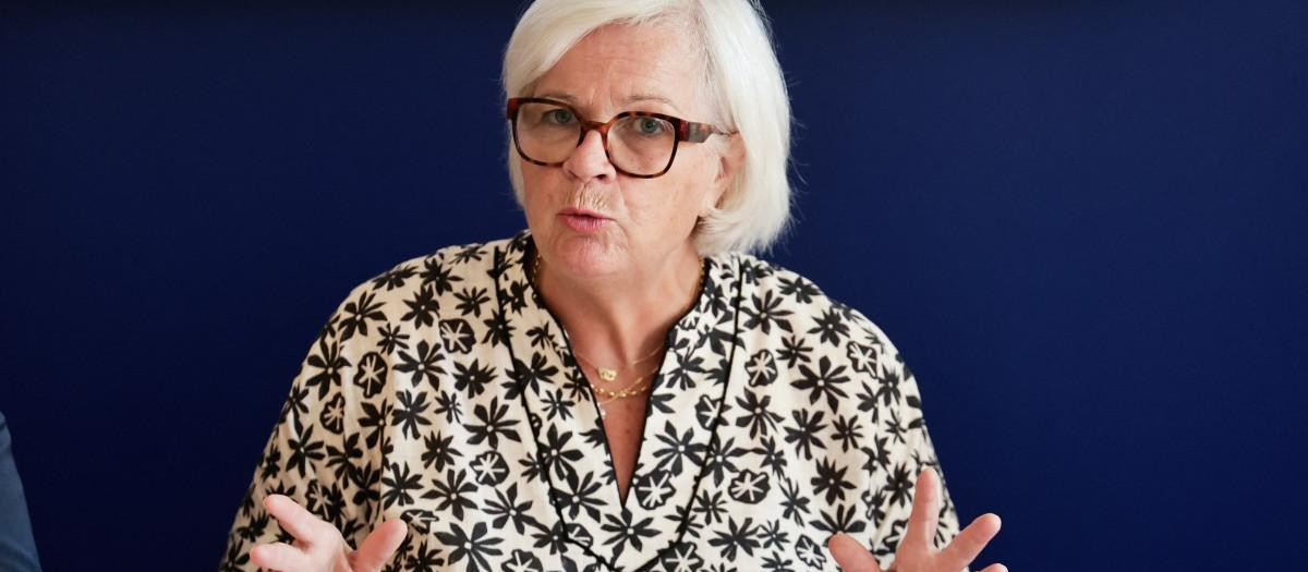 France's Minister of Labor, Health, Solidarities and Families Catherine Vautrin (R) addresses via videoconference from the Operational Centre for Regulation and Response to Health and Social Emergencies (CORRUSS) to update on health and social emergencies related to the heatwave, in Paris, on August 11, 2025. (Photo by STEPHANE DE SAKUTIN / AFP)