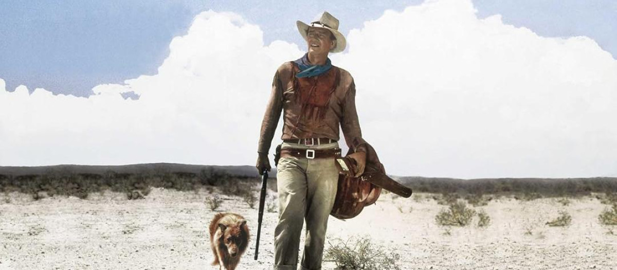 John Wayne, en el rodaje de Hondo
