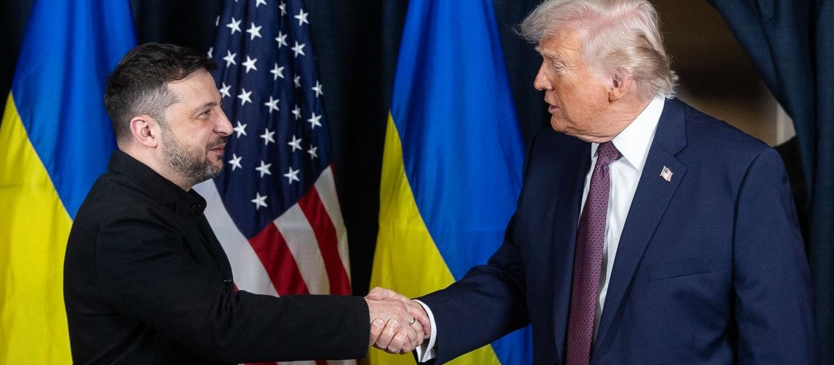 A picture obtained from the X account of Volodymyr Zelensky on January 22, 2026, shows Ukraine's President Volodymyr Zelensky (L) and US President Donald Trump shaking hands during their bilateral meeting on the sidelines of the World Economic Forum (WEF) annual meeting in Davos. (Photo by Handout / X account of Volodymyr Zelensky / AFP) / RESTRICTED TO EDITORIAL USE - MANDATORY CREDIT "AFP PHOTO / X ACCOUNT OF VOLODYMYR ZELENSKY" - NO MARKETING NO ADVERTISING CAMPAIGNS - DISTRIBUTED AS A SERVICE TO CLIENTS