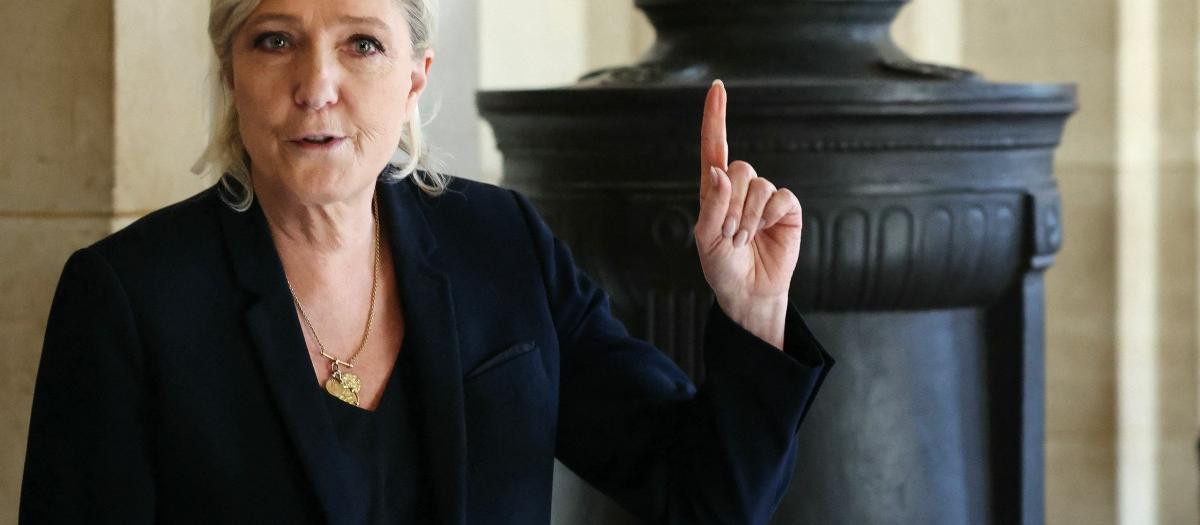 President of Rassemblement National parliamentary group Marine Le Pen arrives after a break in the defense's closing argument in the trial of far-right party Rassemblement National (RN) former or actual members on charges of embezzlement of European public funds in a case of alleged European Parliament fake jobs at the Palais de Justice in Paris on February 4, 2026. The prosecution has requested confirmation of the five-year ban from holding public office against Marine Le Pen in the appeal trial in Paris of the RN MEPs' assistants. This sentence would prevent her from running for president in 2027. The decision of the Court of Appeal, which is not obliged to follow the requisitions, should be known by the summer. (Photo by Alain JOCARD / AFP)
