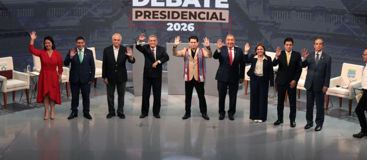 (L to R) Peru's presidential candidates Keiko Fujimori, Charlie Carrasco, Francisco Diez Canseco, Mesias Guevara, Herbert Caller, Mario Vizcarra, Marisol Perez Tello, Paul Jaimes, Roberto Chiabra and Roberto Sanchez take part in the second round of debates on education and employment at the Lima Convention Center in Lima on March 31, 2026. Peru will hold presidential elections on April 12. (Photo by Connie FRANCE / AFP)