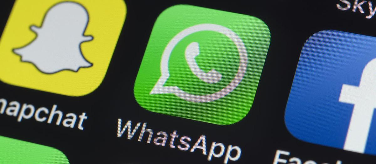 London, UK - July 19, 2018: The buttons of Instagram, Skype, Snapchat, Facebook, WhatsApp, Pinterest and other apps on the screen of an iPhone.