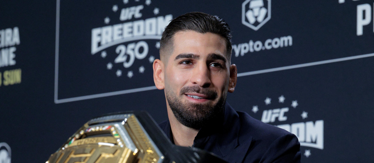 WASHINGTON, DC - JUNE 10: UFC lightweight champion Ilia Topuria talks with reporters at the UFC Freedom 250 Media Day at the JW Marriott Hotel on June 10, 2026 in Washington, DC. Organized by the Ultimate Fighting Championship (UFC) -- the world's largest professional mixed martial arts promotion company -- the event is being hosted by U.S. President Donald Trump on his birthday and will take place on the White House's South Lawn on June 14.   Chip Somodevilla/Getty Images/AFP (Photo by CHIP SOMODEVILLA / GETTY IMAGES NORTH AMERICA / Getty Images via AFP)