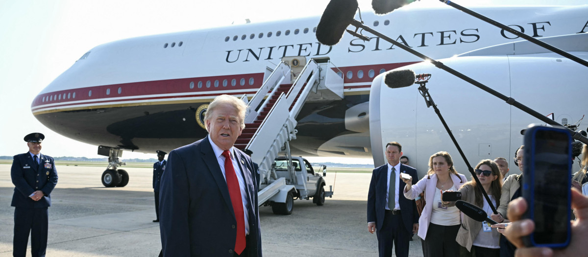 El presidente estadounidense Donald Trump habla con la prensa antes de abordar el Air Force One